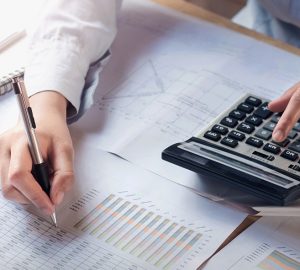 finance and accounting concept. business woman working on desk u